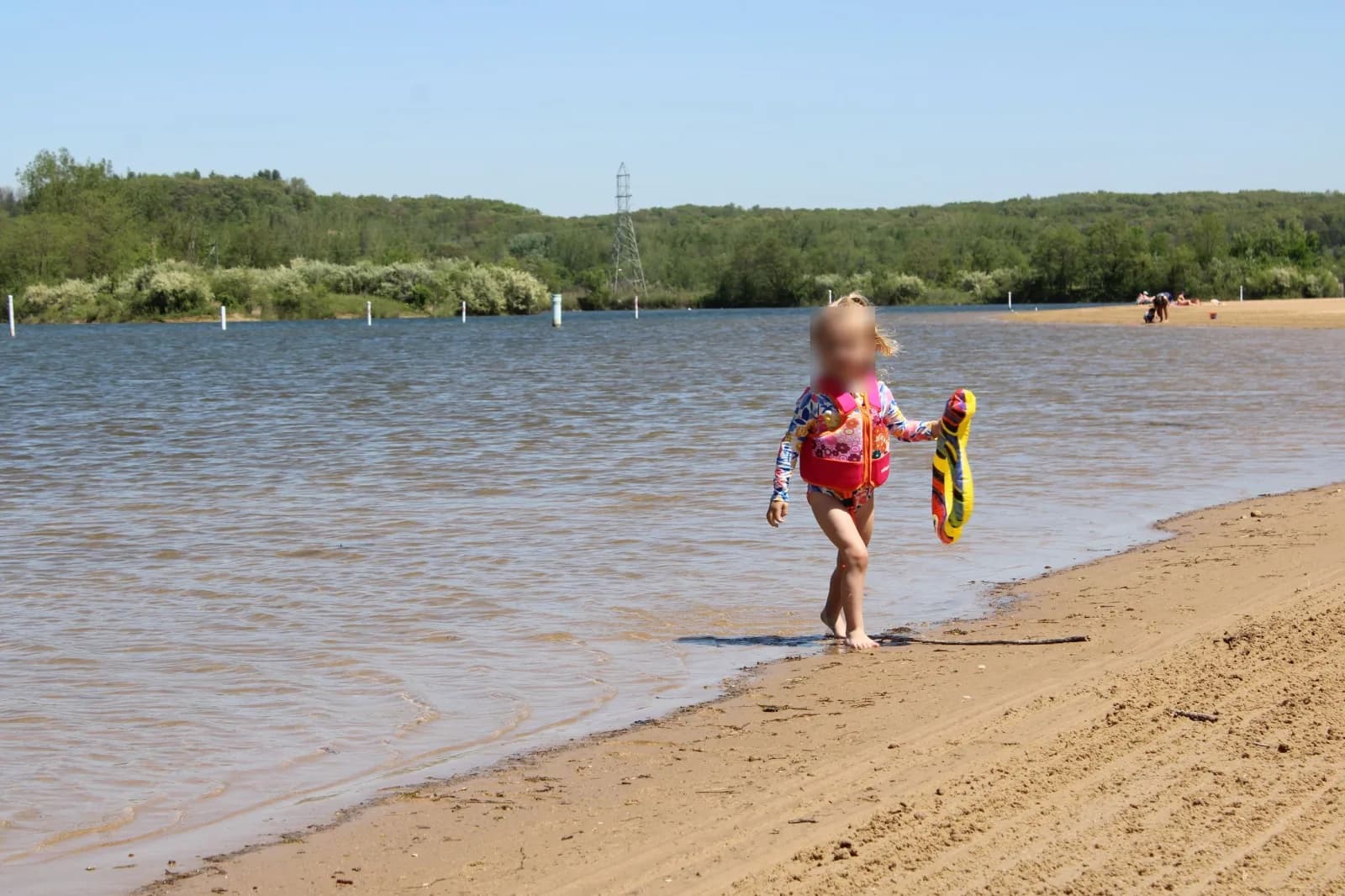 Millennium Lake Beach swimming hole near Walker, Michigan