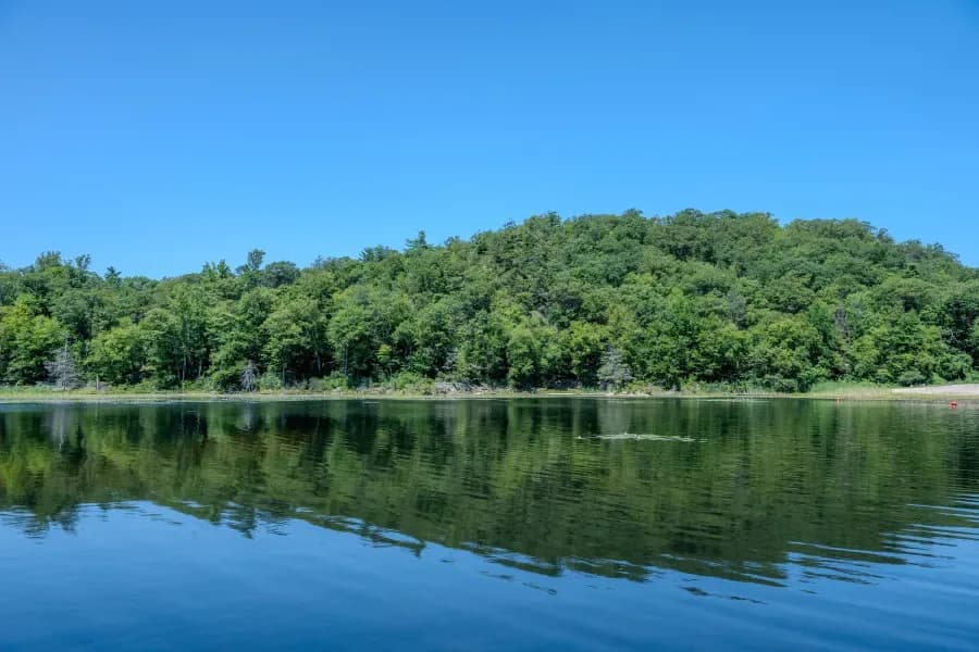 Canopus Lake Beach swimming hole near Kent Cliffs, New York